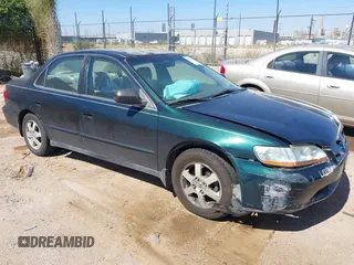 2000 Honda Accord SE z VIN JHMCG5679YC031427, wystawiony jako IAAI lot #42455198 z przebiegiem 106 783 mil mil oraz . Historia ofert i sprzedaży dostępna na DreamBid. Obrazek 1.