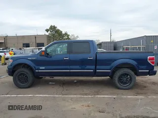 2014 Ford F-150 XL with VIN 1FTFW1ET7EFA52599, listed as a IAAI auction lot 41848890 with 154,353 mi miles. Bid and sale history available at carsss.com. Image 14.