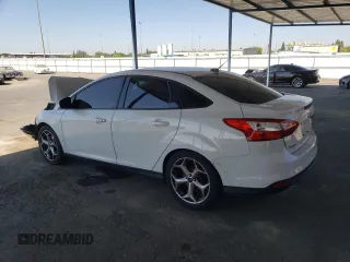 2012 Ford Focus SE with VIN 1FAHP3F20CL468537, listed as a Copart auction lot 64408615 with 173,753 mi miles and Salvage title. Bid and sale history available at DreamBid. Image 2.
