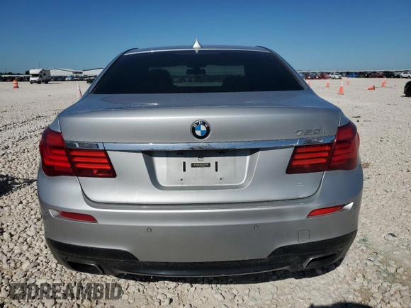 2013 BMW 7 Series 750i с VIN WBAYA8C54DC996698, выставлен на аукционе Copart как лот 53235915 с пробегом 116 247 миль миль и Списание • Salvage title. История ставок и продаж доступна на DreamBid. Изображение 6.