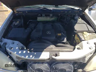 2000 Mercedes-Benz M 320/430/500 with VIN 4JGAB54E7YA151114, listed as a Copart auction lot 50175395 with 166,093 mi miles and Salvage Title. Bid and sale history available at DreamBid. Image 12.
