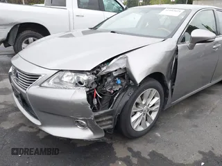 2015 Lexus ES 300h with VIN JTHBW1GG6F2093327, listed as a IAAI auction lot 42107023 with 102,502 mi miles and . Bid and sale history available at DreamBid. Image 6.