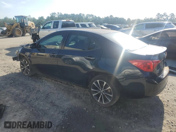 2019 Toyota Corolla L z VIN 5YFBURHE7KP880821, wystawiony jako Copart lot #61599055 z przebiegiem 105 856 mil mil oraz Czysty tytuł • Clean title. Historia ofert i sprzedaży dostępna na DreamBid. Obrazek 2.