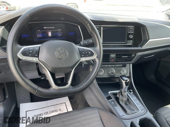2024 Volkswagen Jetta S with VIN 3VW5M7BU5RM054856, listed as a IAAI auction lot 42744213 with 22,414 mi miles and . Bid and sale history available at DreamBid. Image 7.