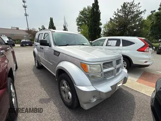 2011 Dodge Nitro SXT z VIN 1D4PT5GK5BW533989, wystawiony jako Copart lot #61019655 z przebiegiem 190 113 mil mil oraz Czysty tytuł • Clean title. Historia ofert i sprzedaży dostępna na DreamBid. Obrazek 1.