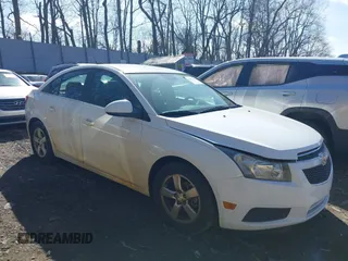 2014 Chevrolet Cruze 1LT z VIN 1G1PC5SB9E7160080, wystawiony jako IAAI lot #41872465 z przebiegiem 79 934 mil mil oraz . Historia ofert i sprzedaży dostępna na DreamBid. Obrazek 1.