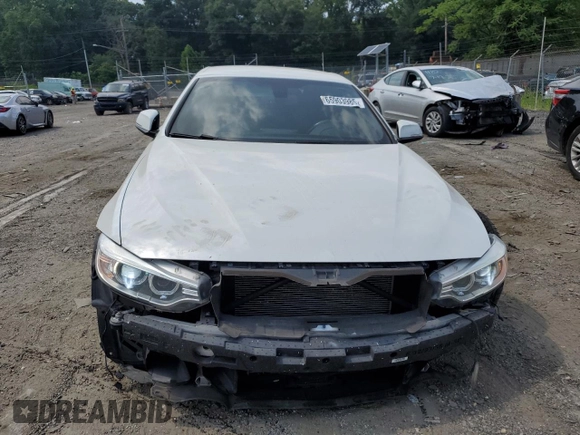 2014 BMW 4 Series 428i xDrive z VIN WBA3T1C56EPS98910, wystawiony jako Copart lot #65903985 z przebiegiem 95 328 mil mil oraz Szkoda całkowita • Salvage title. Historia ofert i sprzedaży dostępna na DreamBid. Obrazek 5.