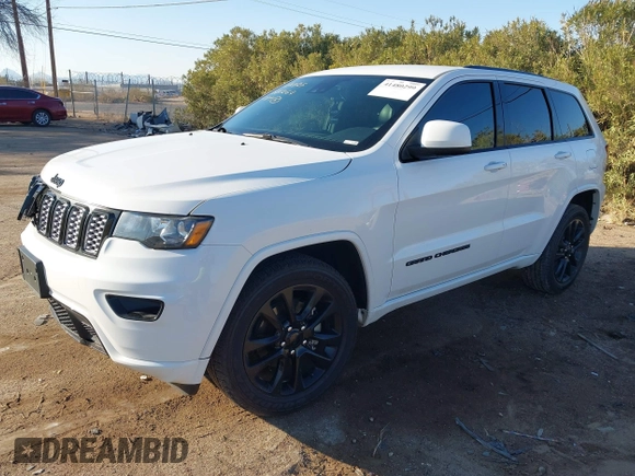 2020 Jeep Grand Cherokee Altitude with VIN 1C4RJEAG1LC251934, listed as a IAAI auction lot 41480299 with 74,169 mi miles and . Bid and sale history available at DreamBid. Image 17.