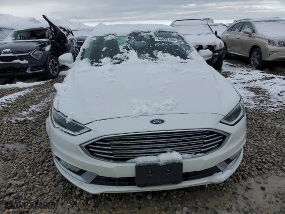 2017 Ford Fusion Energi SE with VIN 3FA6P0PU2HR110659, listed as a Copart auction lot 49099155 with 85,667 mi miles and Clean Title. Bid and sale history available at carsss.com. Image 5.