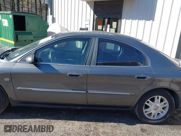 2004 Mercury Sable LS Premium z VIN 1MEHM55S54G607845, wystawiony jako IAAI lot #41812758 z przebiegiem 200 883 mil mil oraz . Historia ofert i sprzedaży dostępna na DreamBid. Obrazek 14.