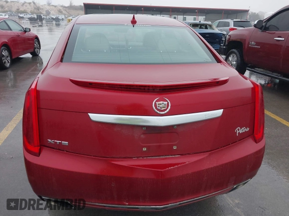 2013 Cadillac XTS Luxury with VIN 2G61P5S32D9115640, listed as a IAAI auction lot 41065284 with 125,643 mi miles and . Bid and sale history available at carsss.com. Image 16.
