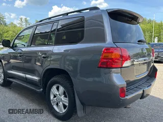 2013 Toyota Land Cruiser z VIN JTMHY7AJ8D4016294, wystawiony jako Copart lot #59005355 z przebiegiem 199 983 mil mil oraz Tytuł czysty. Historia ofert i sprzedaży dostępna na DreamBid. Obrazek 3.