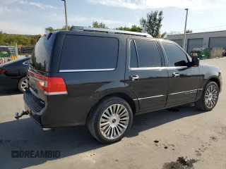 2015 Lincoln Navigator z VIN 5LMJJ2HT5FEJ06248, wystawiony jako Copart lot #52876645 z przebiegiem 270 523 mil mil oraz Szkoda całkowita • Salvage title. Historia ofert i sprzedaży dostępna na DreamBid. Obrazek 3.