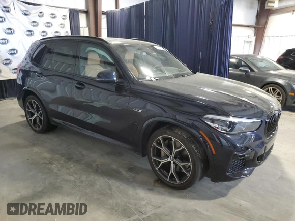 2023 BMW X5 xDrive45e with VIN 5UXTA6C03P9R22002, listed as a Copart auction lot 56293765 with 35,204 mi miles and Salvage title. Bid and sale history available at DreamBid. Image 4.