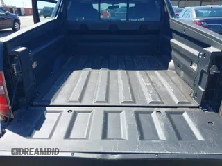 2013 Honda Ridgeline RTL with VIN 5FPYK1F57DB005538, listed as a IAAI auction lot 41985586 with 152,697 mi miles and . Bid and sale history available at DreamBid. Image 12.