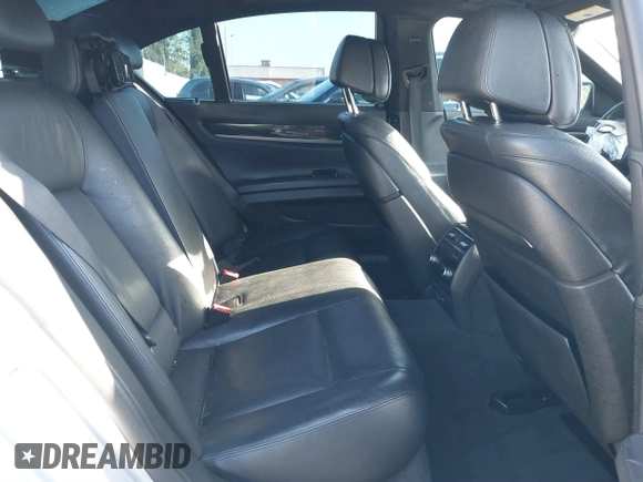 2013 BMW 7 Series 740i with VIN WBAYA6C51DD143836, listed as a IAAI auction lot 39215782 with 176,881 mi miles and . Bid and sale history available at DreamBid. Image 8.
