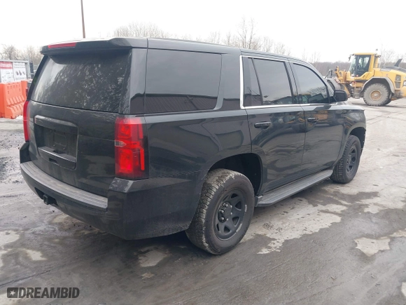 2016 Chevrolet Tahoe Commercial with VIN 1GNSKDEC4GR387517, listed as a IAAI auction lot 41650926 with 120,115 mi miles. Bid and sale history available at carsss.com. Image 4.