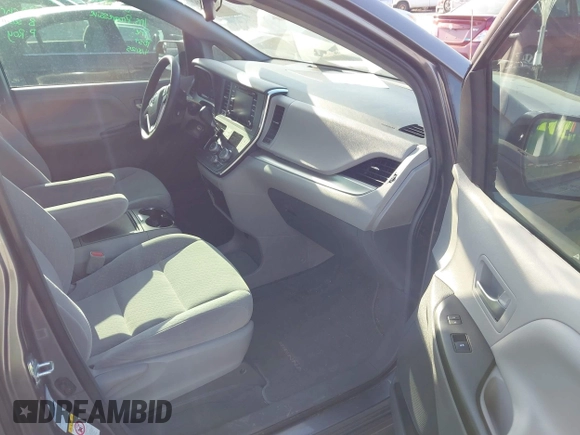 2018 Toyota Sienna LE with VIN 5TDJZ3DC3JS190746, listed as a IAAI auction lot 42161562 with 180,000 mi miles and . Bid and sale history available at DreamBid. Image 5.