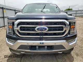 2021 Ford F-150 XL with VIN 1FTFW1E80MFA32611, listed as a Copart auction lot 61899255 with 98,278 mi miles and Salvage title. Bid and sale history available at DreamBid. Image 5.