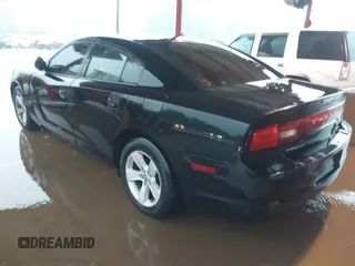 2014 Dodge Charger SE with VIN 2C3CDXBG8EH240828, listed as a IAAI auction lot 42158404 with 211,686 mi miles and . Bid and sale history available at DreamBid. Image 3.