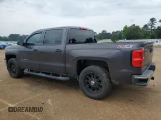 2014 Chevrolet Silverado 1500 LT with VIN 3GCUKREC6EG240496, listed as a Copart auction lot 54252085 with 185,003 mi miles and Salvage Title. Bid and sale history available at DreamBid. Image 2.
