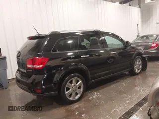 2014 Dodge Journey Limited with VIN 3C4PDDDG7ET154300, listed as a IAAI auction lot 41640132 with 175,276 mi miles and . Bid and sale history available at DreamBid. Image 4.