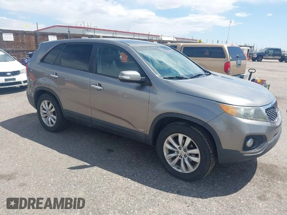 2011 Kia Sorento EX with VIN 5XYKUDA29BG010219, listed as a IAAI auction lot 42106579 with 233,350 mi miles. Bid and sale history available at carsss.com. Image 1.