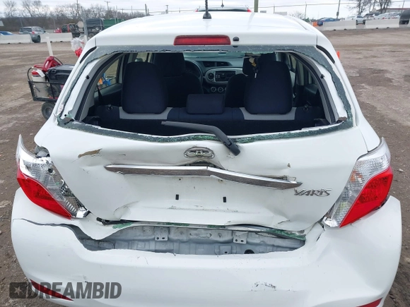 2014 Toyota Yaris L with VIN JTDKTUD34ED589582, listed as a IAAI auction lot 41538884 with 87,798 mi miles. Bid and sale history available at carsss.com. Image 6.