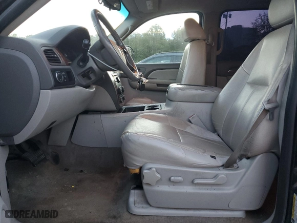2009 Chevrolet Suburban LT w/2LT with VIN 1GNFC26069R230517, listed as a Copart auction lot 75304014 with 360,939 mi miles and Salvage Title. Bid and sale history available at carsss.com. Image 7.