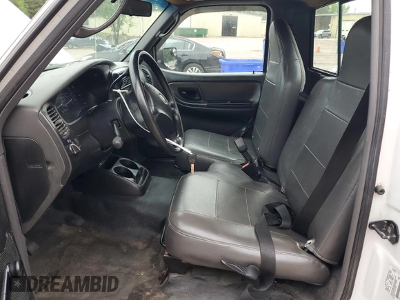 2003 Ford Ranger XL with VIN 1FTYR10D23PB75802, listed as a Copart auction lot 56945515 with 200,436 mi miles and Clean title. Bid and sale history available at DreamBid. Image 7.