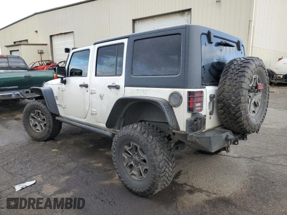 2015 Jeep Wrangler Unlimited Rubicon with VIN 1C4BJWFGXFL693566, listed as a Copart auction lot 46628765 with 70,128 mi miles and Salvage Title. Bid and sale history available at carsss.com. Image 2.