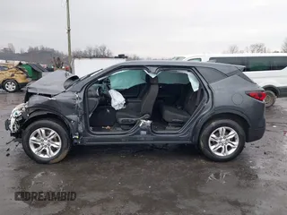 2021 Chevrolet Blazer LT z VIN 3GNKBHR46MS522595, wystawiony jako IAAI lot #41683458 z przebiegiem 93 613 mil mil oraz . Historia ofert i sprzedaży dostępna na DreamBid. Obrazek 14.
