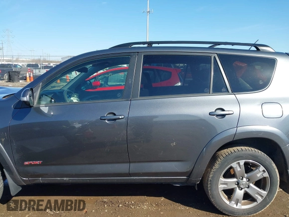 2011 Toyota RAV4 Sport with VIN JTMRF4DV6B5045551, listed as a IAAI auction lot 41822319 with 207,349 mi miles. Bid and sale history available at carsss.com. Image 15.