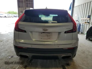 2019 Cadillac XT4 FWD Premium Luxury with VIN 1GYFZCR46KF198424, listed as a Copart auction lot 55465185 with 84,706 mi miles and Salvage title. Bid and sale history available at DreamBid. Image 6.