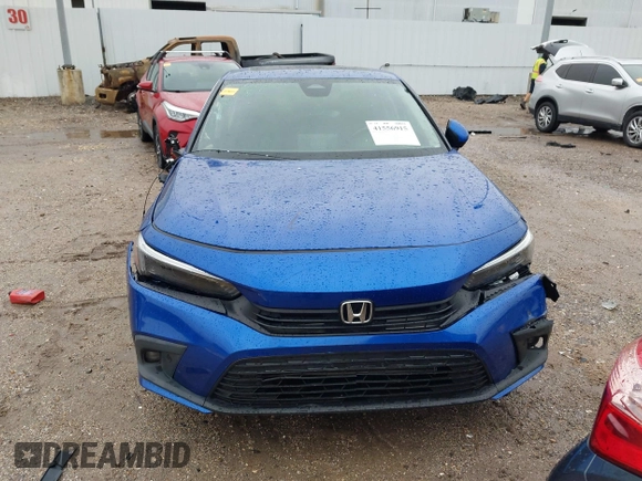 2023 Honda Civic Touring z VIN 2HGFE1F92PH317695, wystawiony jako IAAI lot #41556915 z przebiegiem 20 421 mil mil oraz . Historia ofert i sprzedaży dostępna na DreamBid. Obrazek 13.