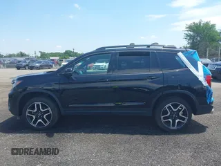 2023 Honda Passport Elite with VIN 5FNYF8H01PB030270, listed as a IAAI auction lot 42667744 with 7,931 mi miles and . Bid and sale history available at DreamBid. Image 14.