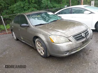 2002 Nissan Altima SL z VIN 1N4AL11DX2C208557, wystawiony jako IAAI lot #42522797 z przebiegiem 111 700 mil mil oraz . Historia ofert i sprzedaży dostępna na DreamBid. Obrazek 1.