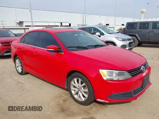 2014 Volkswagen Jetta Sedan SE w/Connectivity with VIN 3VWD07AJ8EM433021, listed as a IAAI auction lot 41695648 with 186,984 mi miles. Bid and sale history available at carsss.com. Image 1.