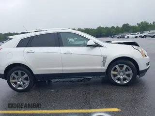 2012 Cadillac SRX Performance Collection with VIN 3GYFNBE38CS547423, listed as a IAAI auction lot 42276365 with 157,786 mi miles and . Bid and sale history available at DreamBid. Image 13.