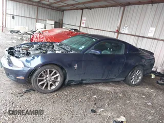 2011 Ford Mustang V6 with VIN 1ZVBP8AM9B5153645, listed as a IAAI auction lot 41304583 with 123,204 mi miles and . Bid and sale history available at carsss.com. Image 14.