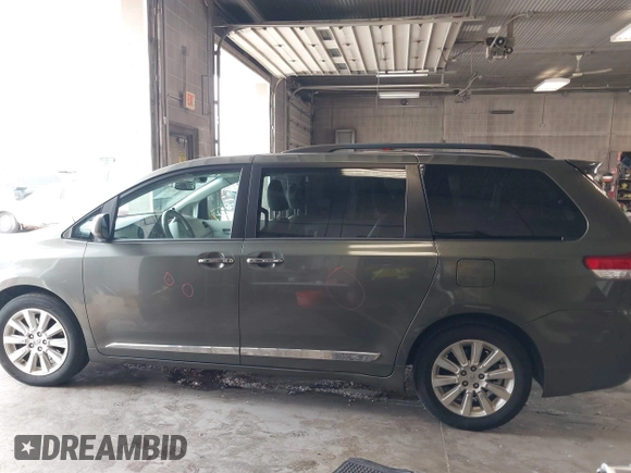 2013 Toyota Sienna XLE with VIN 5TDDK3DC9DS061903, listed as a IAAI auction lot 42067873 with 166,341 mi miles and . Bid and sale history available at DreamBid. Image 15.