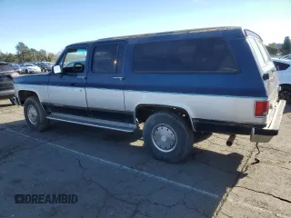 1991 Chevrolet Suburban z VIN 1GNGV26K1MF104219, wystawiony jako Copart lot #87527045 z przebiegiem 189 345 mil mil oraz Czysty tytuł • Clean title. Historia ofert i sprzedaży dostępna na DreamBid. Obrazek 2.