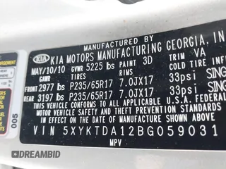 2011 Kia Sorento LX with VIN 5XYKTDA12BG059031, listed as a IAAI auction lot 42194720 with 220,000 mi miles. Bid and sale history available at carsss.com. Image 9.