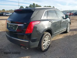 2019 Cadillac XT5 Luxury FWD z VIN 1GYKNCRSXKZ102866, wystawiony jako IAAI lot #41335840 z przebiegiem 59 563 mil mil oraz . Historia ofert i sprzedaży dostępna na DreamBid. Obrazek 4.