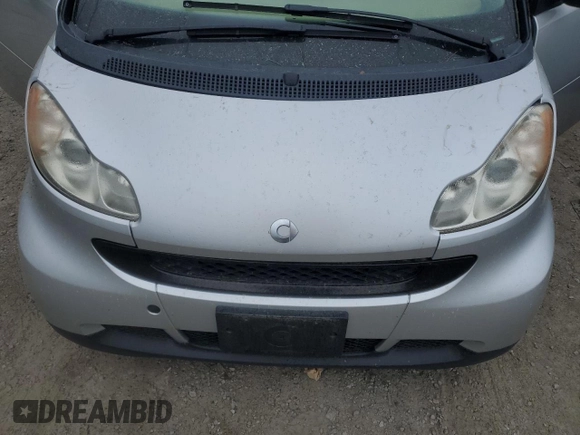 2008 Smart fortwo Pure z VIN WMEEJ31XX8K195221, wystawiony jako Copart lot #57217555 z przebiegiem 54 525 mil mil oraz Tytuł czysty. Historia ofert i sprzedaży dostępna na DreamBid. Obrazek 11.
