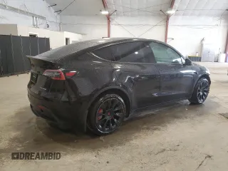2021 Tesla Model Y Long Range with VIN 5YJYGDEE8MF252824, listed as a Copart auction lot 53801315 with 31,084 mi miles and Salvage Title. Bid and sale history available at DreamBid. Image 3.