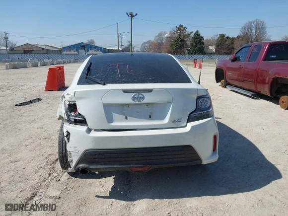 2016 Scion tC with VIN JTKJF5C70GJ019590, listed as a IAAI auction lot 41798426 with 69,045 mi miles. Bid and sale history available at carsss.com. Image 16.