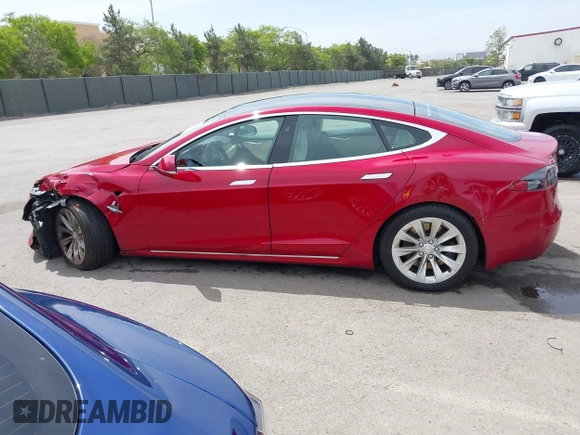 2018 Tesla Model S 75D with VIN 5YJSA1E29JF273494, listed as a IAAI auction lot 42246104 with 93,870 mi miles and . Bid and sale history available at DreamBid. Image 14.