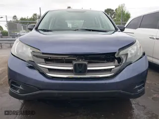 2014 Honda CR-V LX with VIN 3CZRM3H39EG703959, listed as a IAAI auction lot 41990964 with 87,424 mi miles. Bid and sale history available at carsss.com. Image 6.