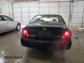 2000 Nissan Maxima GXE z VIN JN1CA31A1YT211725, wystawiony jako Copart lot #47401895 z przebiegiem 122 228 mil mil oraz Szkody całkowita. Historia ofert i sprzedaży dostępna na DreamBid. Obrazek 6.